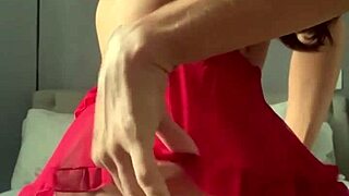 The transsexual in fishnets spreads for solo cock play in the video call