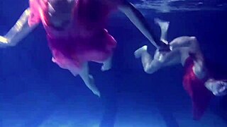 lilia mihalkova and natalia kupalka dive into underwater fun as russian lesbian babes in the pool.