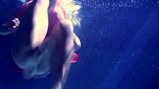 lilia mihalkova and natalia kupalka dive into underwater fun as russian lesbian babes in the pool.