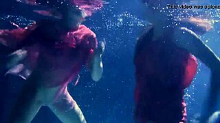 lilia mihalkova and natalia kupalka dive into underwater fun as russian lesbian babes in the pool.