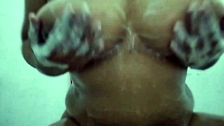 Horny Asian slut with big boobs, why massage your chubby body with soapy water?