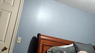 In a casual setting, chubby Marilyn explores pleasure with her favorite wand.