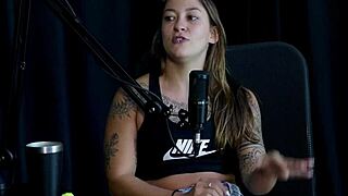 Flor de Damiana enjoys the exhibitionist side with Kidi Bengala in a see-through red outfit during a wild swinger interview full of domination and group orgasm fun outdoors.