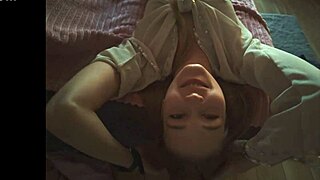 Sexy sister asks for help taking erotic photos for her boyfriend. She poses seductively in lingerie.