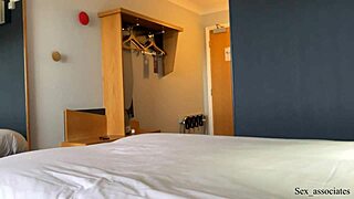 Woman and man end up sharing a bed during their hotel stay unexpectedly