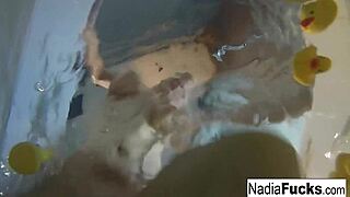 Nadia Bathes With Rubber Duckies