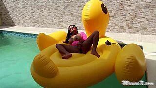 On the beach, sexy Asian housewife in lingerie and heels moans loudly while trying to fit a huge BBC dildo into her tight wet pussy hole.