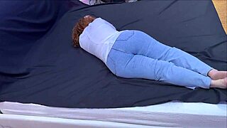 woman forgot her jeans were still on and a man assisted her with removal in a casual moment