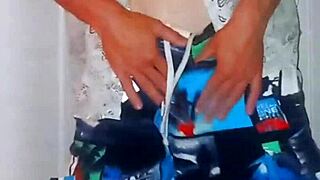 Big chocolate CFNM guy SPINS like a pinwheel to music in modest hot striptease with clothes ripped