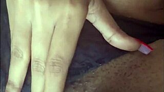 Can this ebony beauty control her urges while fingering those fat pierced pussy lips to orgasm?