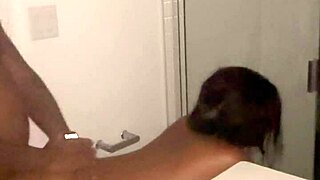 In the steamy shower, a slim petite 18+ beauty gets pounded by a monster cock in hardcore doggystyle action, leading to a wet pussy cumshot and facial finish from her amateur partner.