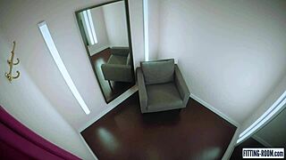 Spanish milf Lorena masturbates in changing room wearing stockings