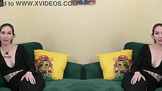 Young babe Kit Summers models two-piece black outfit with deep plunging neck in photoshoot