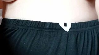 Wow this pregnant milf is spitting on her big tits and nipples