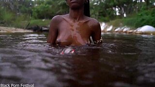 skinny african hottie teases softly in water