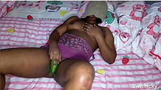 This curvy ebony babe got so horny she grabbed a cucumber and fucked her fat pussy solo.