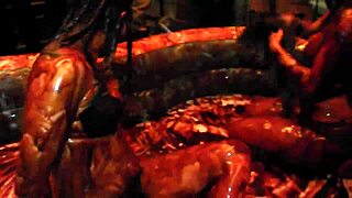 Whoa, check out King Cures dominating in chocolate wrestling by the pool! 💪🍫