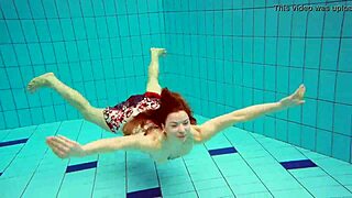 I dive underwater with hot Polish teen Marketa in bikini. we flash petite tits at public pool and beach