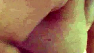 Milf plays with pussy in bathtub then sucks cock deep, rides on top, and gets cum over huge natural tits.