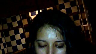 busty brunette babe chats about her skills in a hotel setting