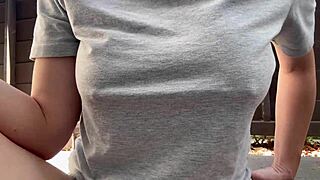 why is this horny italian milf with big tits smoking outdoors up close?