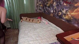 A woman in fox cosplay and black pantyhose engages in intimate activity. She poses in various positions.