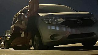 Cuckold husband watches wife suck gloryhole cock in car. She gets caught flashing and blowing stranger in public outdoor spot.