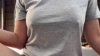 why is this horny italian milf with big tits smoking outdoors up close?