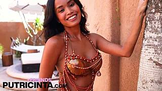 Horny asian babe Putri Cinta shows off her huge tits