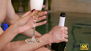 blonde fuck doll licks ass wildly before riding cock in steamy pool rimjob