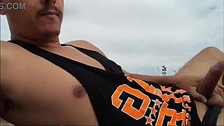 Guy on nude beach gets wild and spills tons of milk in amateur action