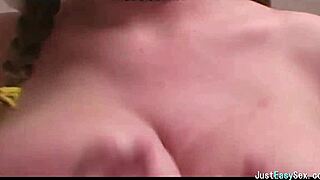 pigtailed brunette teases big tits solo.