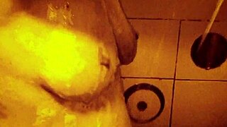 sexy milf relaxes in wet slow motion shower showing ass and tits solo