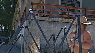 Setting up a tent on the farm while wearing a tight body outfit