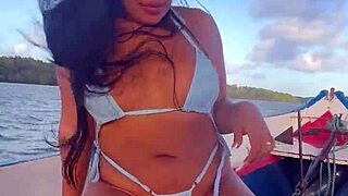 brazilian latina wife in bikini on boat ride... showing off her curves