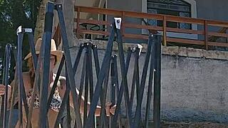 Setting up a tent on the farm while wearing a tight body outfit