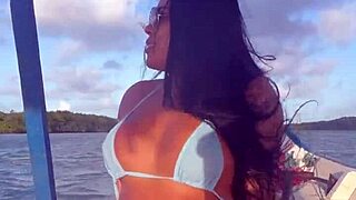 brazilian latina wife in bikini on boat ride... showing off her curves