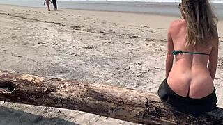 she kept jerking my big cock publicly at the beach until i exploded everywhere!