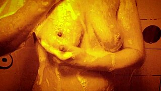sexy milf relaxes in wet slow motion shower showing ass and tits solo