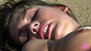 beach babe juliette fingers her tight hairy pussy on the sand until she cums hard