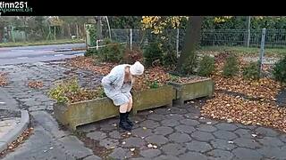 brunette milf flashes natural tits in public stripping and outdoor undressing