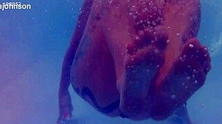 melissa the mermaid shows brown eyes and tattoo by the pool in milf solo scene