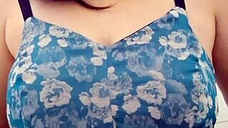 in a quiet scene the solo asian babe with big natural tits gently plays with balloons alone