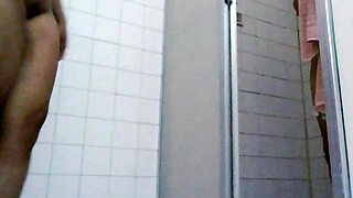 Real couple gets intensely wet in steamy home bathroom shower session