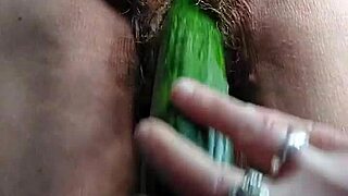 Granny Slut Fucks Hairy Pussy with Cucumber