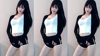 cute chinese asian girl boldly dances with super speed showcasing impressive moves and sexy flair in captivating routine