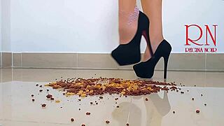 Cornflakes get destroyed with high heels boots on the floor