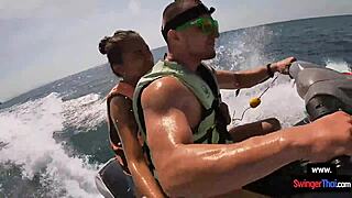 Oh man this Asian girlfriend is giving a blowjob in public on a jetski with her boyfriend.