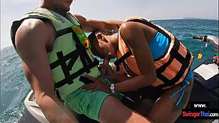 Oh man this Asian girlfriend is giving a blowjob in public on a jetski with her boyfriend.