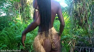 Why does this perfect body dark skin african girl dance half naked outdoors in the village forest?